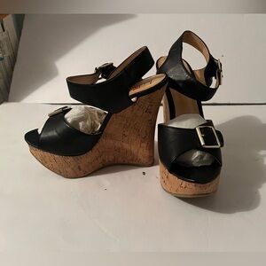 luichiny “taken “ black buckled wedge sandal 
size 9
